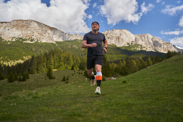 Mature trail runner in the mountains