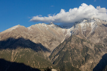 Snow capped mountains in himalaya landscape with rocks. Kailash mountain peak in Tibet.