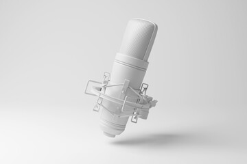 White studio condenser microphone floating in mid air in monochrome and minimalism. Illustration of the concept of recording studios for music production and vocals