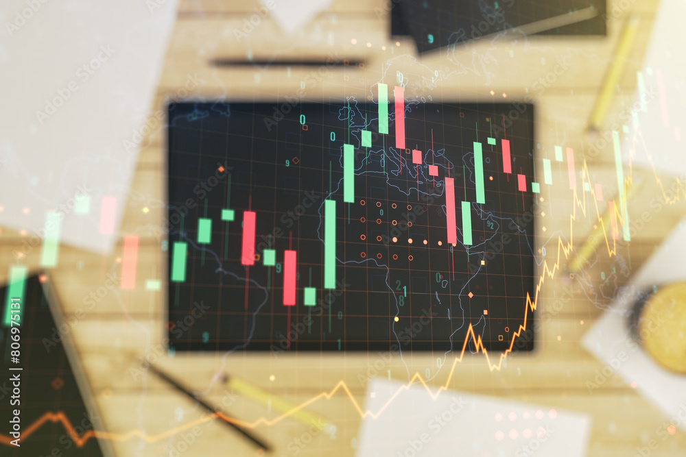 Poster multi exposure of abstract financial graph with world map and modern digital tablet on desktop on ba