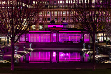 Stockholm, Sweden  The reflection of a landmark building in the  Kungstradgarden park at night...