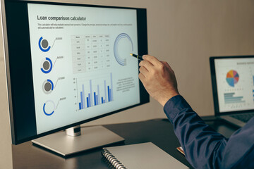 Businessman analyzing company financial report, balance sheet, working with document graphs Save photos for the stock market, office, taxes, close-up photos.