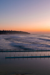 Naklejka premium Sunrise view from Curl Curl rock pool, Sydney, Australia.
