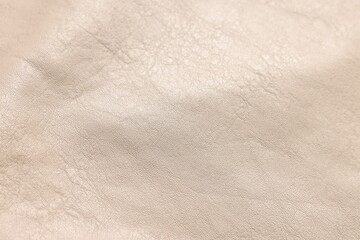 Beige natural leather as background, above view