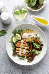 Healthy dish high in vegetable fats on light textured table, top view
