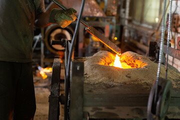 Foundry - ferrous metal is melted in an induction furnace of metallurgical plant - 807000562