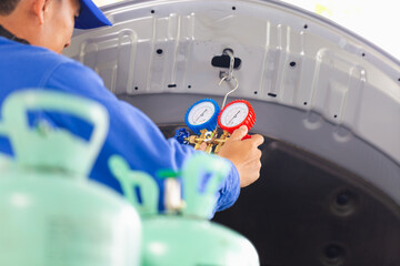 Technician man check car air conditioning system refrigerant recharge, Car Air Conditioning Repair