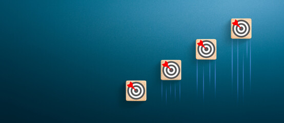 Target icons on wooden cubes, Target concept, copy space
