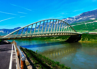 Modern tied arch bridge over the Adige in northern Italy