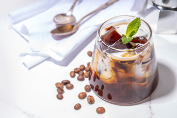 Coffee Jelly Dessert made with strong espresso coffee, gelatin or agar and whipped cream. Asian...
