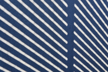 texture of diagonal lines shadows on a grey wall