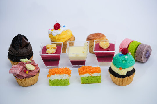Dessert for afternoon Tea or High Tea , macaron, scone, cake, cup cakes in many color