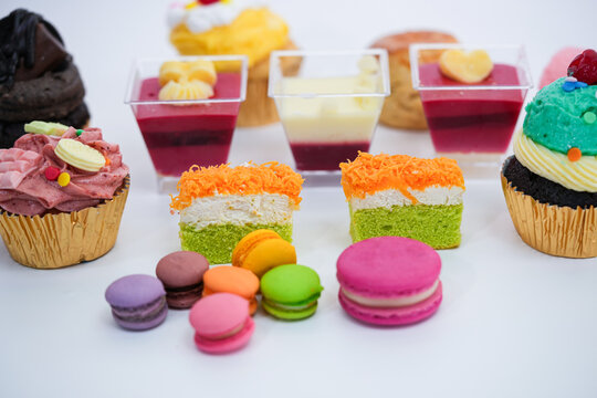 Dessert for afternoon Tea or High Tea , macaron, scone, cake, cup cakes in many color