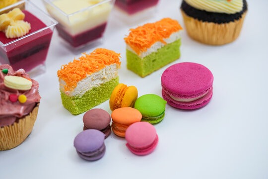 Dessert for afternoon Tea or High Tea , macaron, scone, cake, cup cakes in many color