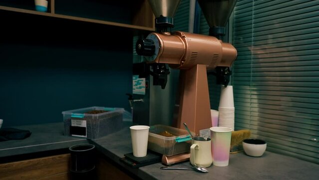 at coffee roasting factory in the kitchen there is a coffee grinder with all the paraphernalia for testing