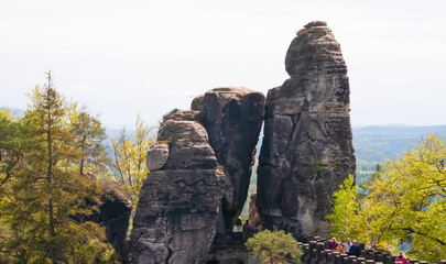Saxon Switzerland National Park, Germany - April 19, 2124: The people going at Bastei bridge, Saxon Switzerland National Park
