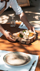 Delicious rich Traditional Turkish breakfast include tomatoes, cucumbers, cheese, butter, eggs, honey, bread, bagels, olives and tea cups. Ramadan Suhoor
