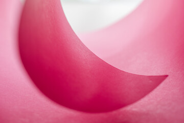 Pink circles create abstract paper art.