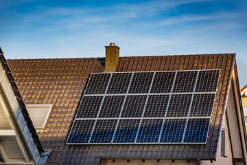 Photovoltaic panels on a roof  of family house, solar system