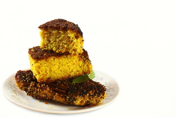 traditional homemade indian gujarati spicy snack cake handvo or handwa,spicy khaman dhokla,white background,top view,copy space