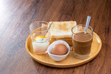 A delicious Japanese meal with rice, pork, and various side dishes.