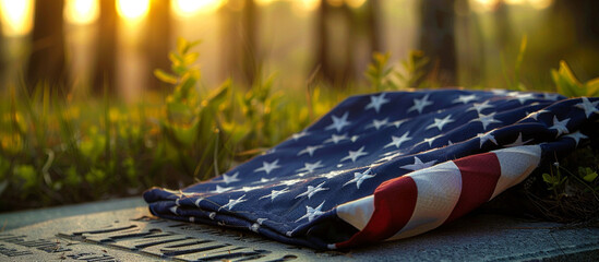 A close-up shot of a folded American flag resting on a soldier's grave on Memorial Day, the high-resolution image capturing the reverence and respect shown to those who made the ultimate sacrifice