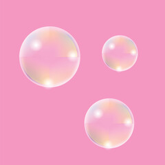 soap bubbles on a pink background