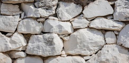 Pattern of dry stone walls in lava stone and brick