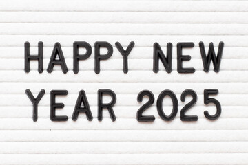 Black color letter in word happy new year 2025 on white felt board background