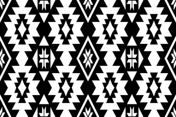 Fototapeta premium Tribal aztec vector retro seamless pattern on white background. Navajo southwest. Geometric ethnic oriental seamless pattern traditional. Mexican style. fabric, clothing, carpet, textile, batik, rug