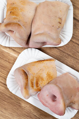 top view raw hog snouts at vertical composition