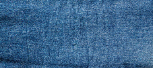 texture of blue jeans denim fabric background