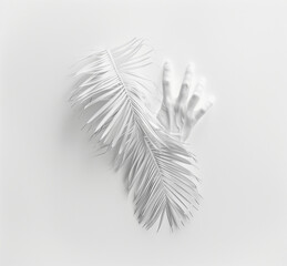 White hand with white  palm leaf on a white background.Minimal creative nature concept.Flat lay
