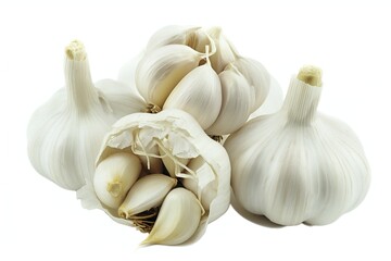 Group of white garlic bulbs and cloves isolated on a white backdrop, showcasing freshness and culinary ingredients
