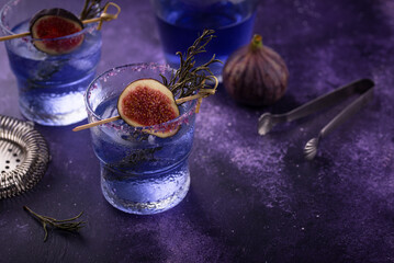 Purple fig cocktail or mocktail in glass
