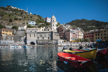 Mediterranean coast of sunny Italy - picturesque coast with rocks and boats - tourist route