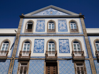blue ceramic tiles on Old town building in Aveiro pictoresque village street view, The Venice Of Portugal