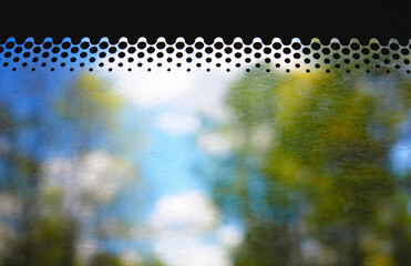 Dirty window in public bus transportation backdrop