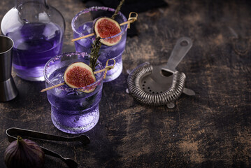 Purple fig cocktail or mocktail in glass