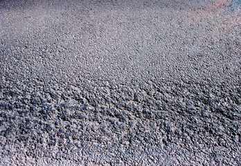 Bumpy texture of road asphalt background