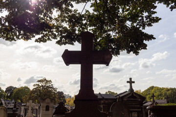 a cross in a cemetery