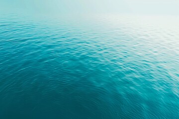 Fototapeta premium Tranquil Blue Ocean Water Surface Background with Gentle Waves