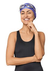 Young Caucasian female professional swimmer smiling happy and confident, touching chin with hand.