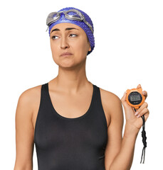 Young swimmer sad over speed drop with stopwatch