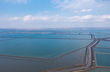 Aerial photography of the seaside and aquaculture farms in Dongying City, Shandong Province