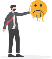 Suffering disappears. Businessman holds a melting sad face icon
