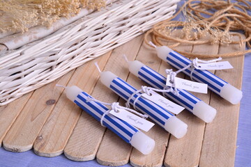 Summer wedding beach party favours white candles witn blue stripes pattern decoration, diy guest...