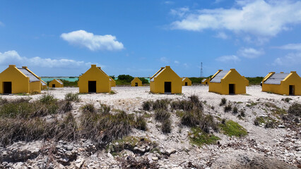 Red Slave Huts At Kralendijk In Bonaire Netherlands Antilles. Island Beach. Blue Sea Landscape....