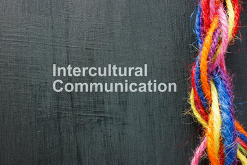 Intercultural communication concept. Multi-colored threads twisted into one rope.