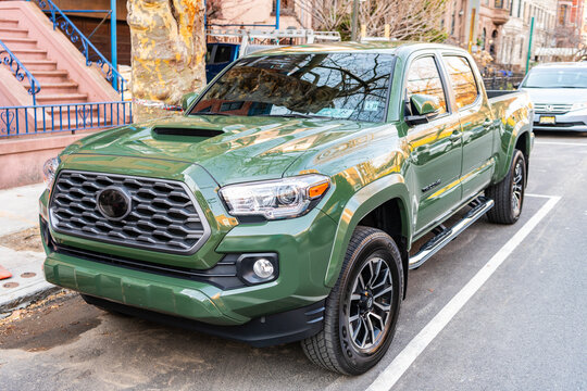 New York City, USA - March 15, 2024: 2021 Toyota Tacoma TRD Sport V6 car green color parked outdoor, corner view